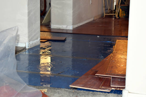 Professional Flood Damage Restoration technician working in Cherokee, NC